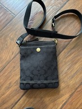 Coach Crossbody Bag. Adjustable Strap, Black Signature Logo Exterior.