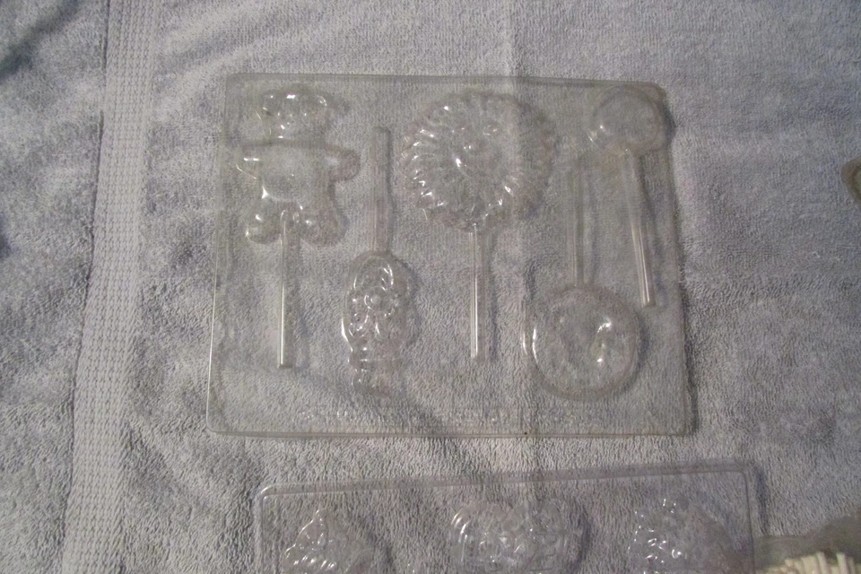 WILTON, SUN HILL &? Moldes de caramelo de chocolate en un palo 3 hojas con instrucciones (K Foto 2 de 4