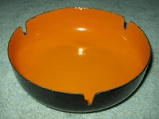 Vtg Huta Silesia enamel coated steel ashtray, black w orange interior, Poland
