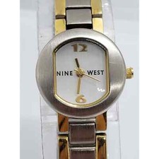Women's Nine West dress watch. Two toned band. 9W/1086 763H/2 Working watch