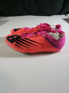 pink new balance spikes