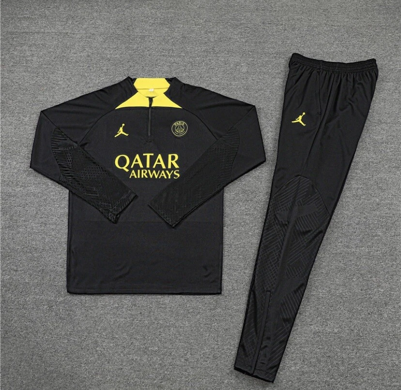 Black and cheap yellow jogging suit