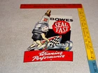 VINTAGE BOWES SEAL FAST PERFORMANCE RACE CAR & SPARK PLUG 12" METAL GAS OIL SIGN