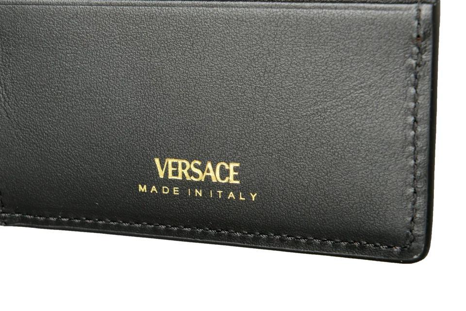 Cartera plegable Versace negra y dorada con estampado barroco 100 % cuero Foto 4 de 4