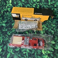 CATERPILLER AMERICAN LAFRANCE FIRE TRUCK DIECAST BANK USED IN BOX BY ERTL 1996