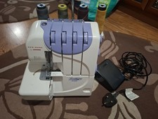 New Home by Janome 9102d Overlocker Sewing Machine With Footpedal
