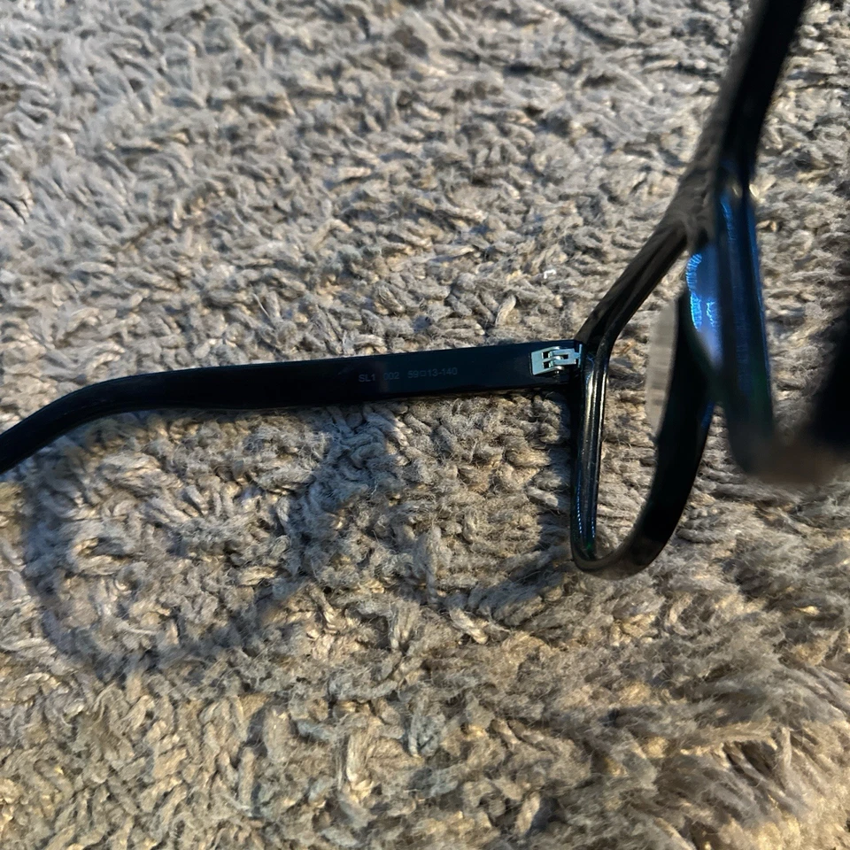 Marco negro para gafas de sol Yves Saint Laurent Foto 4 de 4