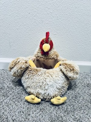 This is a plush rooster or chicken-themed Easter basket.