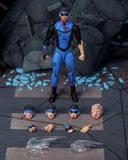 Jada Toys SDCC 2026 Exclusive Invincible Battle Damaged Deluxe Figure In Hand
