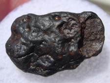 2.22 grams NWA 4502 Meteorite as found individual Carbonaceous (CVox3) with COA