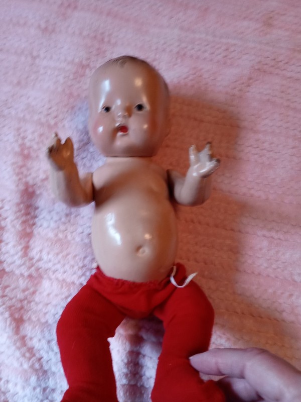 vintage bisque doll with painted eyes great condition for age 