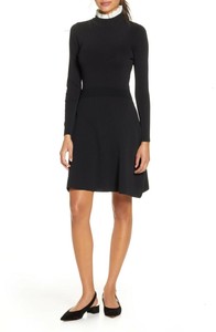 black dress with white collar long sleeves