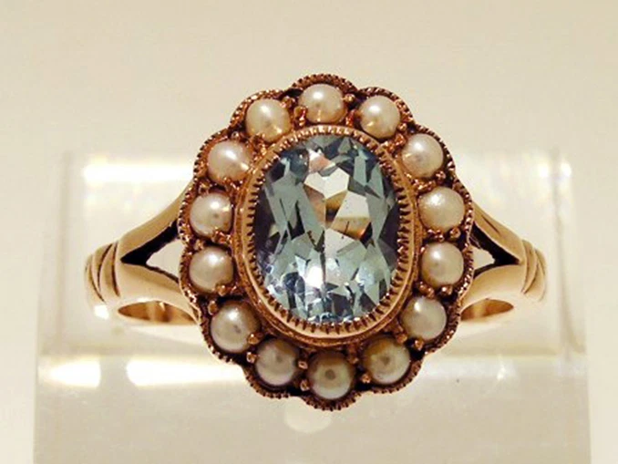 Topaz and 2024 pearl ring