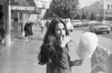 1960s Negative-sexy brunette pinup girl with cotton candy in Los Angeles t936381