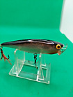Rapala skip and popp topwater lure silver/black.