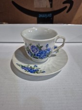 Vintage Miniature Porcelain Tea Cup And Saucer With Blue Flowers