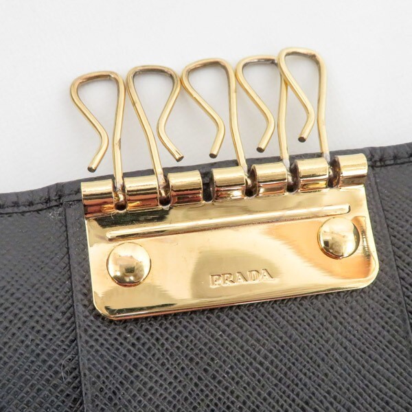 PRADA Saffiano 6-row key case 1PG222 black with gold-colored