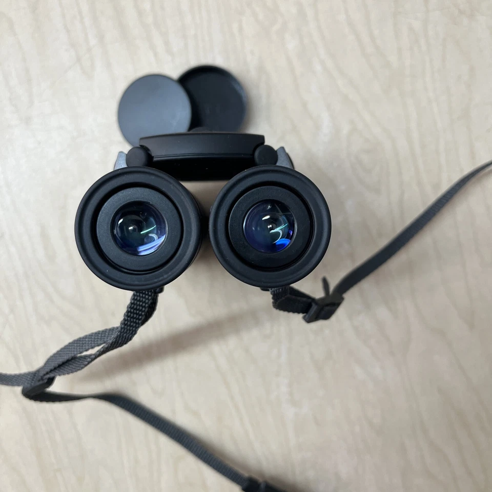 Nikon Binoculars Sportstar III 10x25 6.5 Degree WF Water Resistant w/ Case - Image 3 of 4