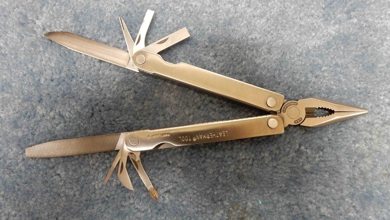 Leatherman Tool -  vintage model - unused - engraved - USA - leather case