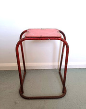 Mid 20th century red metal and wood factory stool