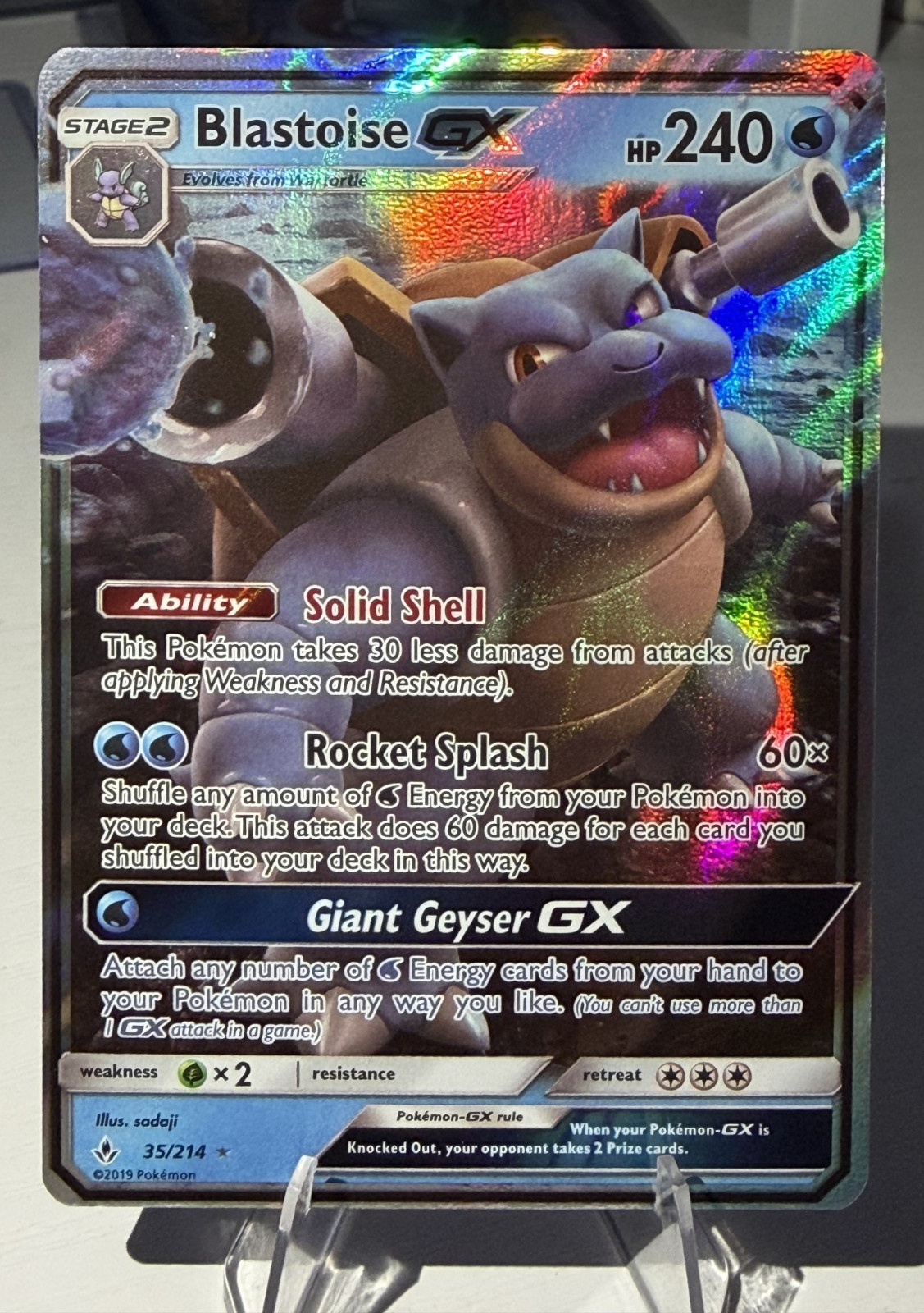 Blastoise GX 35/214 Sm-Unbroken Bonds Holo