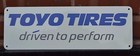 TOYO TIRE SIGN PROXES OPEN COUNTRY DRIVEN TO PERFORM ADVERTISING LOGO TIRE SHOP — photo 1