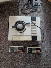 Nintendo Entertainment System (NES) Console with Two Controllers