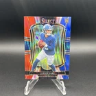 2025 Panini Select - Premier Level Jaxson Dart #193 Red & Blue Shock Prizm (RC)