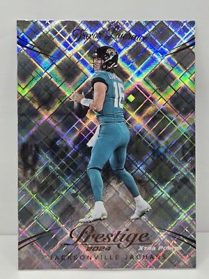 Trevor Lawrence 2024 Panini Prestige #134 Diamond Xtra Trevor Lawrence 2024 Panini Prestige #134 Diamond Xtra