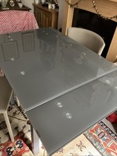  Smoked Grey Glass Top Extending Dining Table. Seats 6.