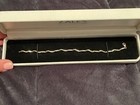 diamond accents - 1/2ct Tw - 7” Zales 10k gold curvy tennis bracelet with 24