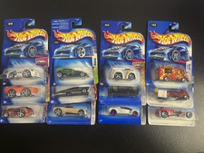 Lot of 12 Hot Wheels Cars Sealed on Card - Various years.