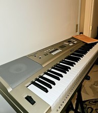Discontinued Piano-Focused 76-Key Yamaha Portable Grand YPG-235, Silver 2007