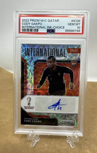 2022 PRIZM FIFA WORLD CUP QATAR CODY GAKPO INTERNATIONAL INK CHOICE AUTO PSA 10