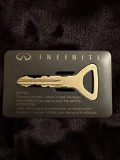 Vintage Infiniti Vehicle Key Original 