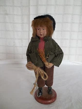 Nice Caroler boy in green coat