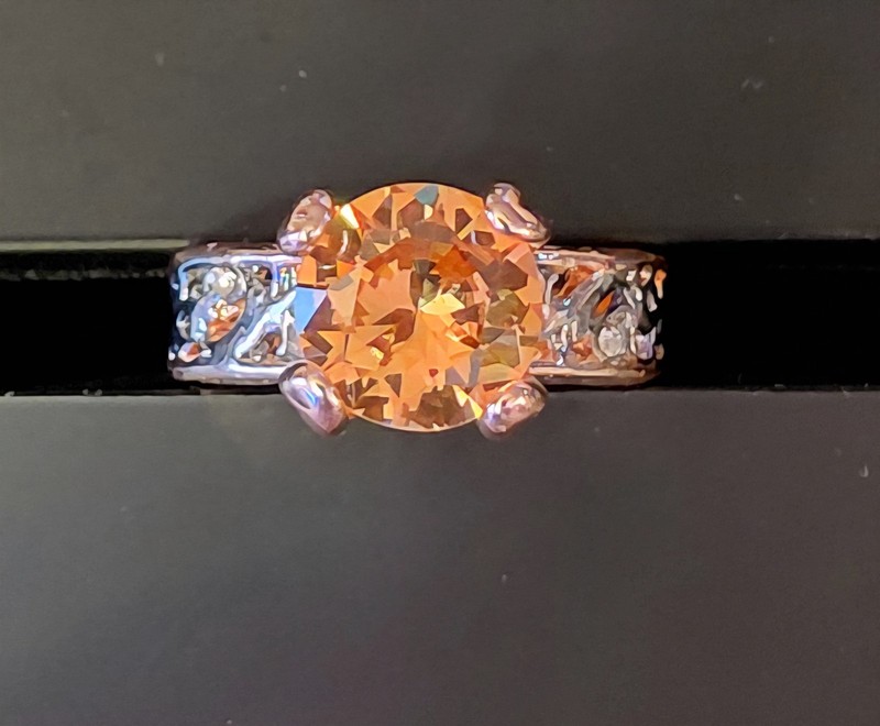 Fashion Ring With Round Central Stone Flanked By Filigree. Size 8