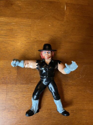 Hasbro WWF WWE Undertaker 4.25 in Action Figure...
