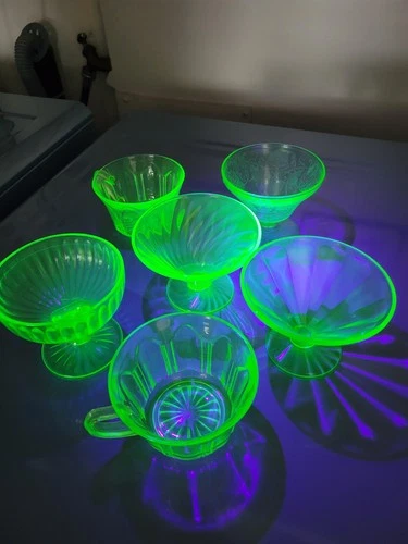 Vintage lot of  Uranium Glass  dishes and  mugs plus candle holder