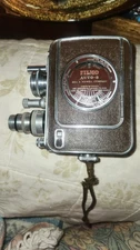 VINTAGE BELL & HOWELL FILMO AUTO-8 CAMERA W/LEATHER CASE  Winds, Spins