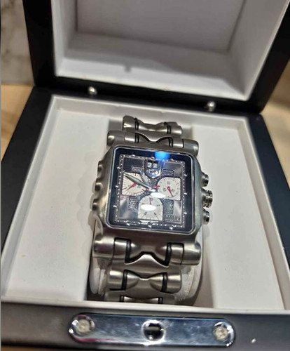 oakley minute machine time tank watch