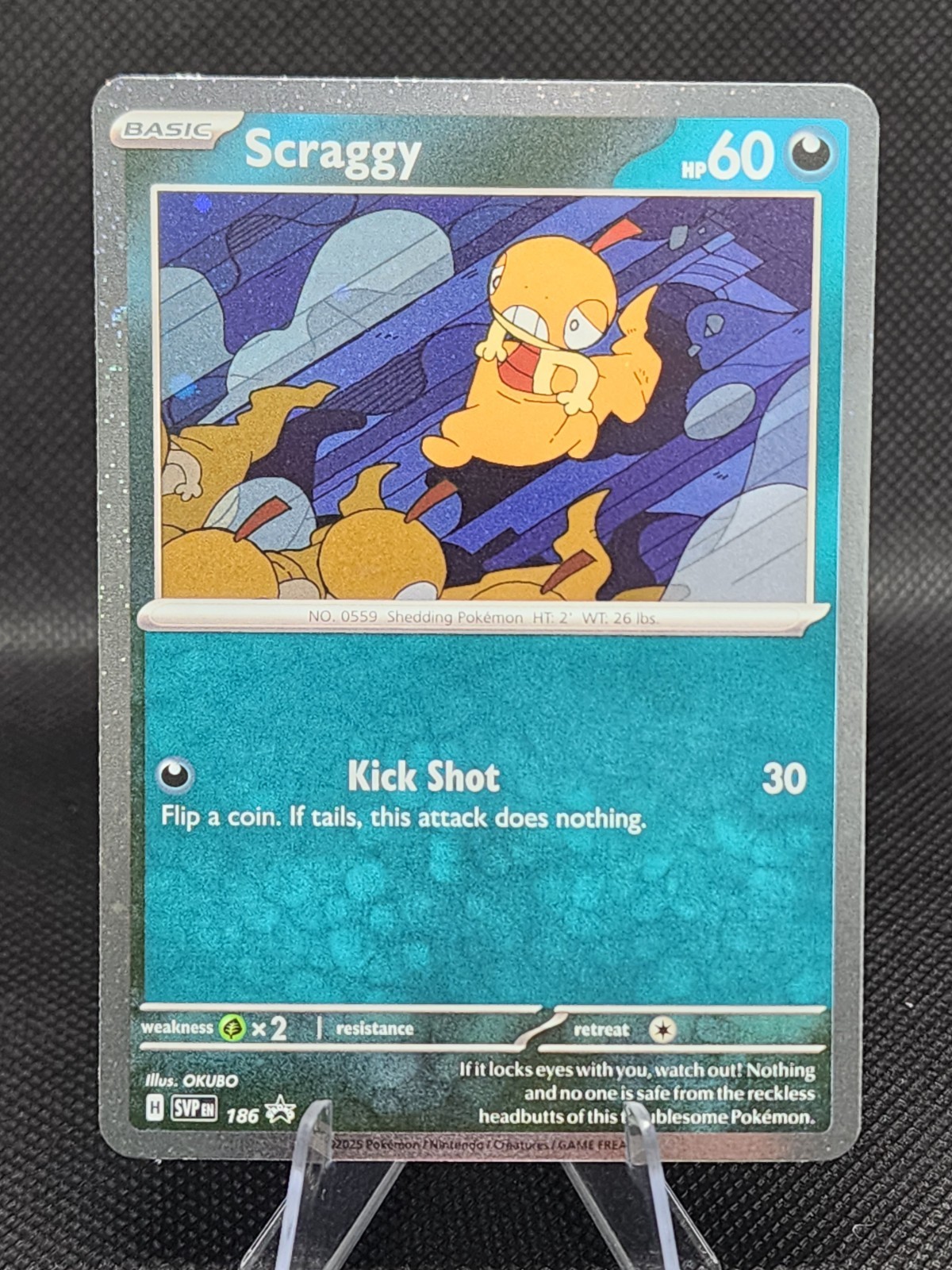 Pokémon TCG Scraggy Black Star Promo SVP186 Cosmos Holo Card