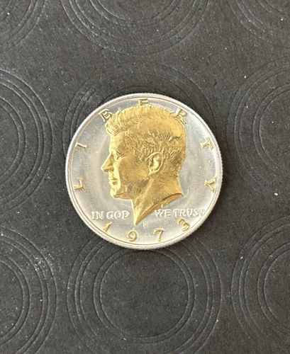 DANBURY MINT  -1973-D- KENNEDY HALF DOLLAR- UNCIRCULATED- GOLD AND SILVER PLATED