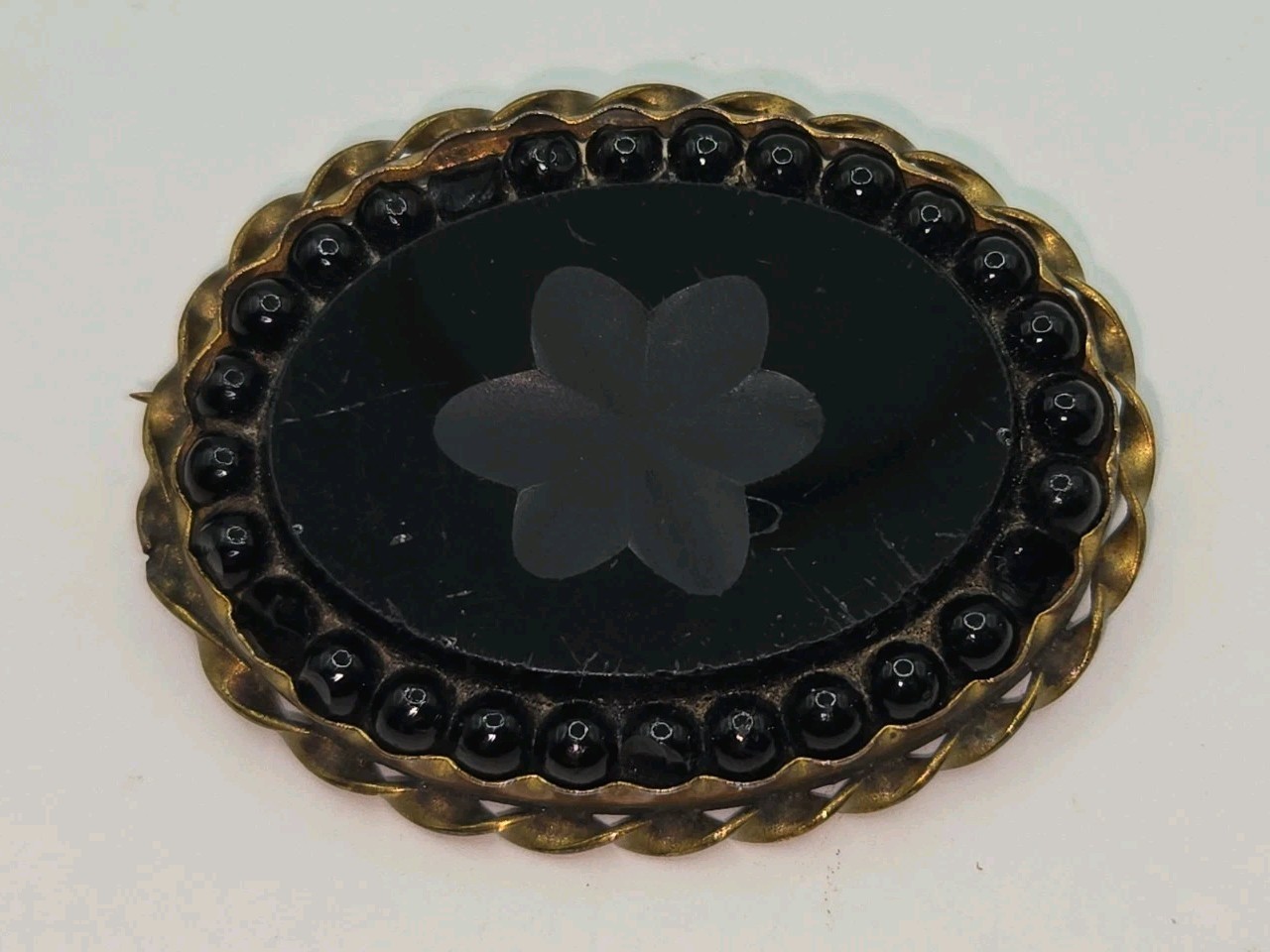 Antique Victorian Black Mourning Brooch with Etched Flower Design