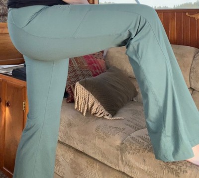 LIV LIV yoga pants with flare leg and side pockets, fern green, size L, form fit