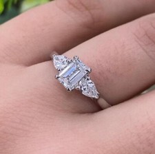 1.50Ct D/VS Lab-Grown Emerald & Pear Cut Three Stone Engagement Ring In Platinum