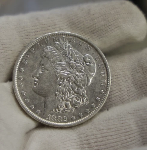 1882 O US Morgan Silver Dollar $1 XF (Cleaned, Retoned)