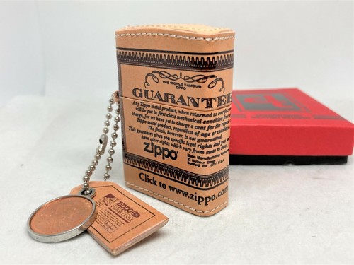 New ZIPPO Limited Edition "Guarantee" Leather-Bound Lighter w Cent & Tag Charm