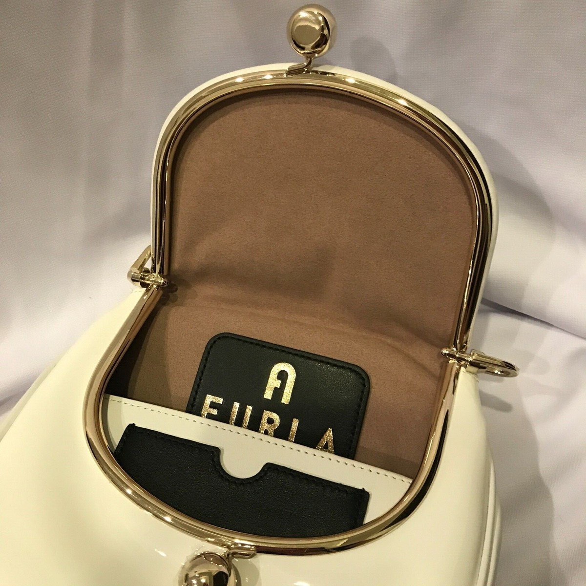 【FURLA】PORTAGIOIA クロスボディ ミニ FURLA】大人女子の秋コーデに合う新作クロスボディバッグ全3色