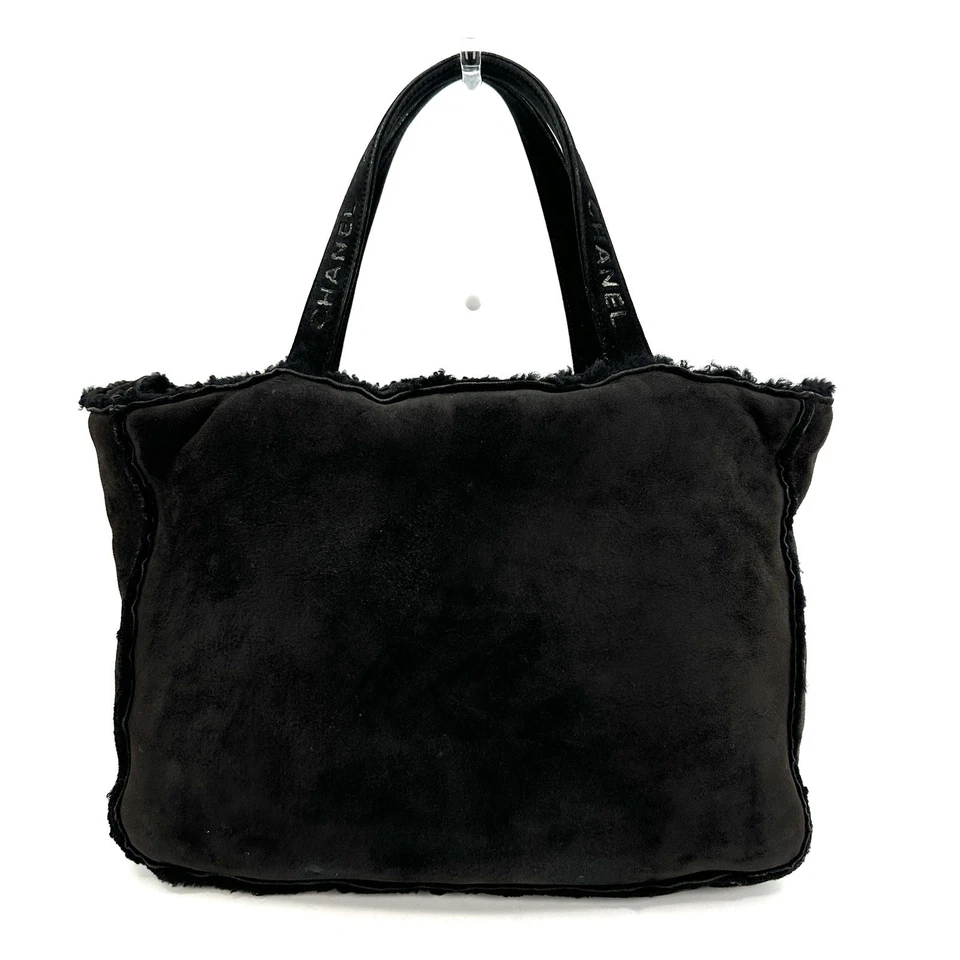 Auténtico bolso de mano de gamuza acolchado vintage de Chanel de cuero negro Foto 3 de 4